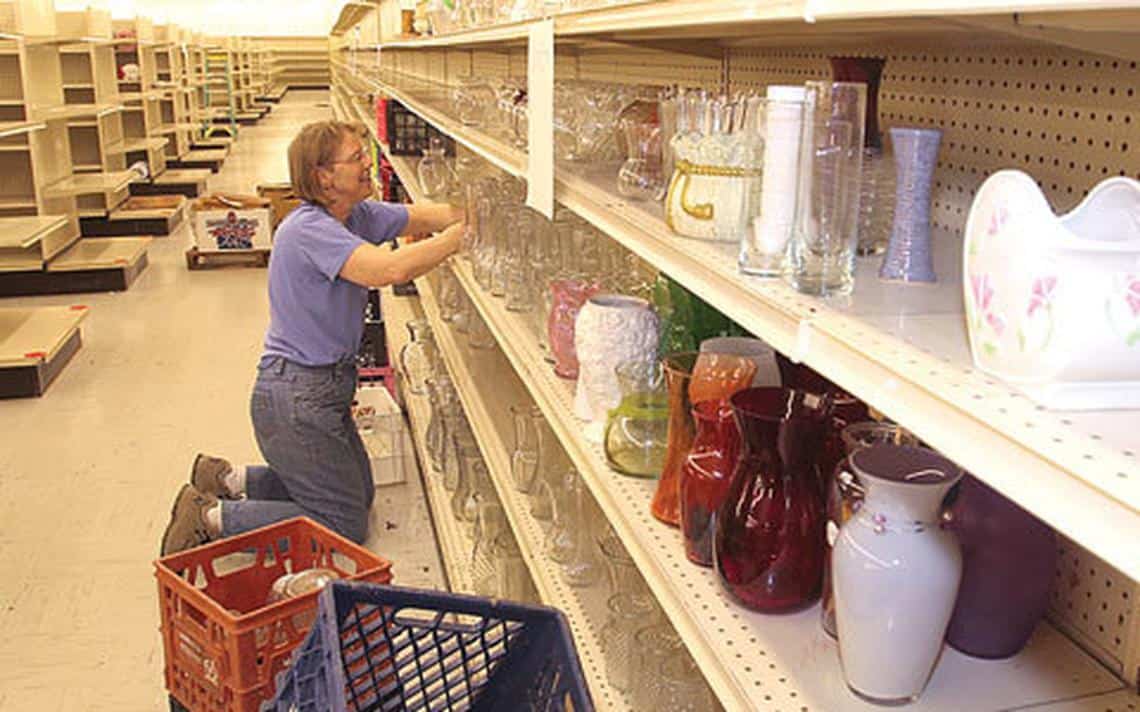 Staff stocking shelves